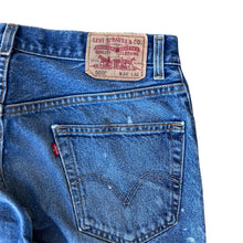 Load image into Gallery viewer, Vintage Paint Splattered Released Hem Levis 505 Jeans
