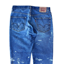 Load image into Gallery viewer, Vintage Paint Splattered Released Hem Levis 505 Jeans
