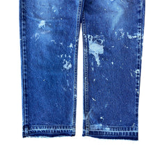 Load image into Gallery viewer, Vintage Paint Splattered Released Hem Levis 505 Jeans
